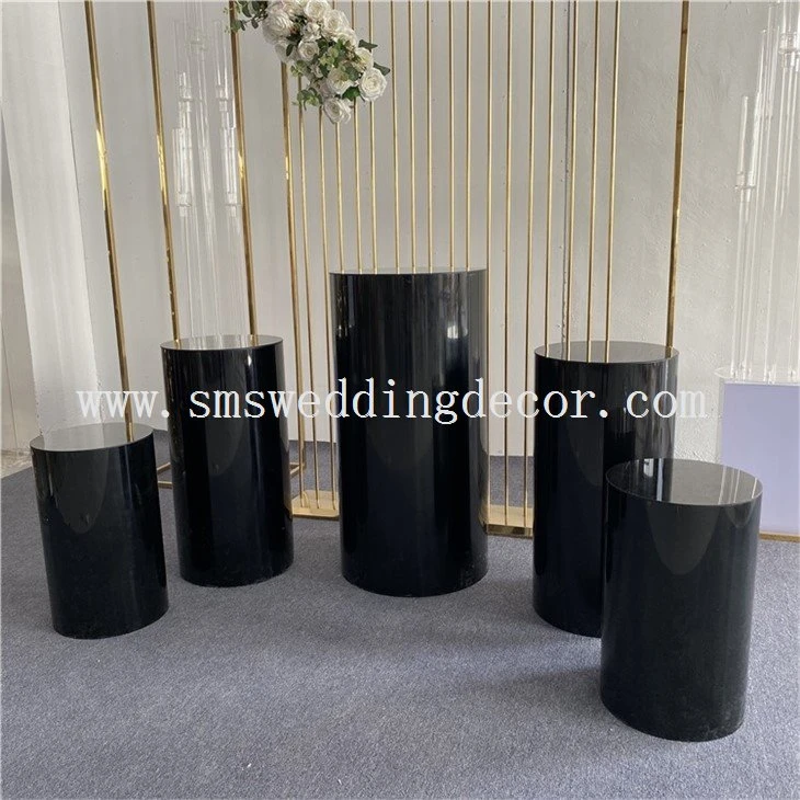tall black pedestal